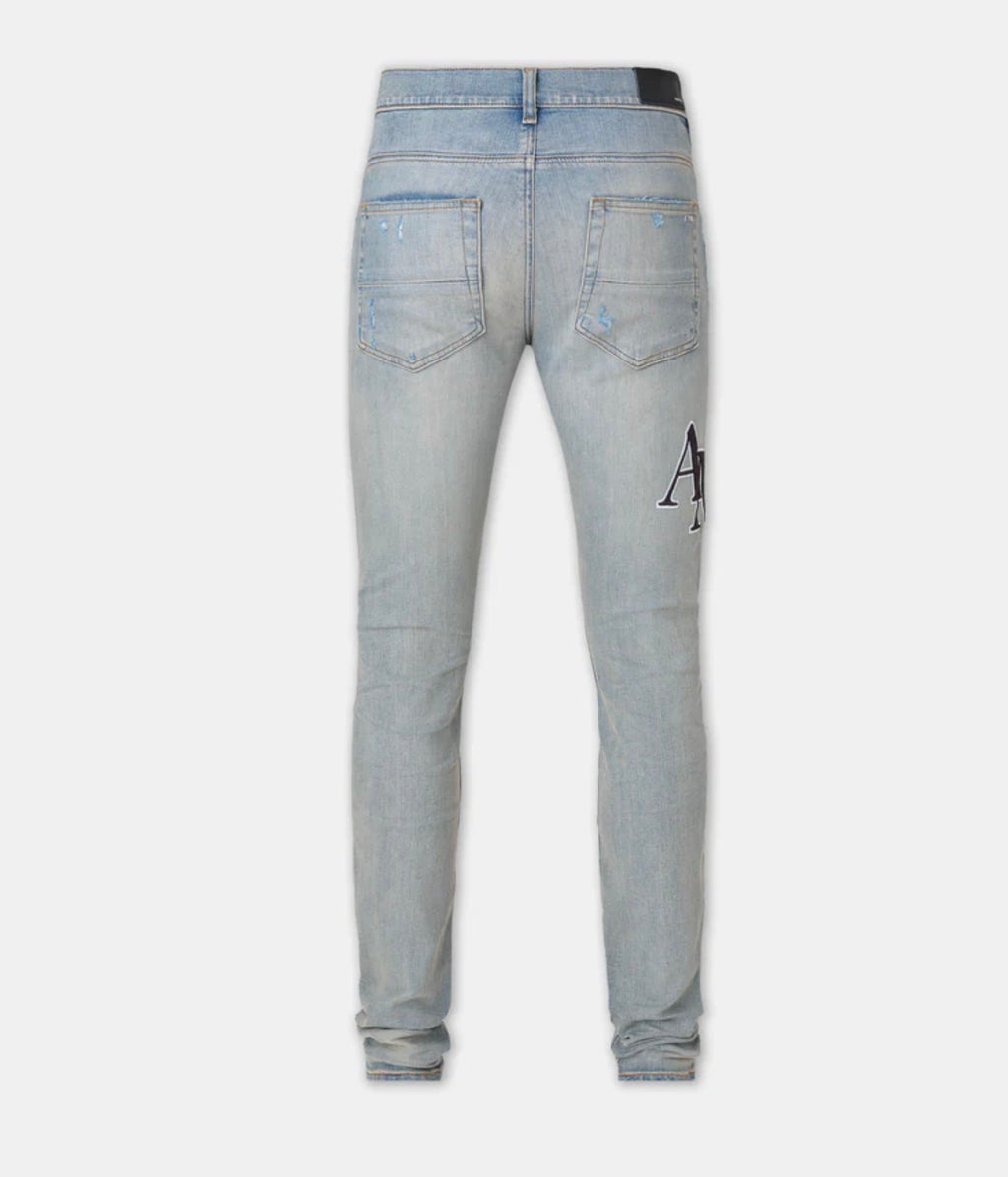 STAGGERED EMBROIDERED LOGO AMIRI JEAN